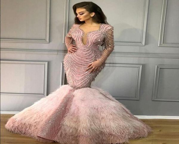 luxury mermaid yousef aijasmi evening dresses long sleeve v neck beading crystals feather dubai arabic prom gowns caftan abendklei6758099, Black;red
luxury mermaid yousef aijasmi evening dresses long sleeve v neck beading crystals feather dubai arabic prom gowns caftan abendklei6758099, Black;red