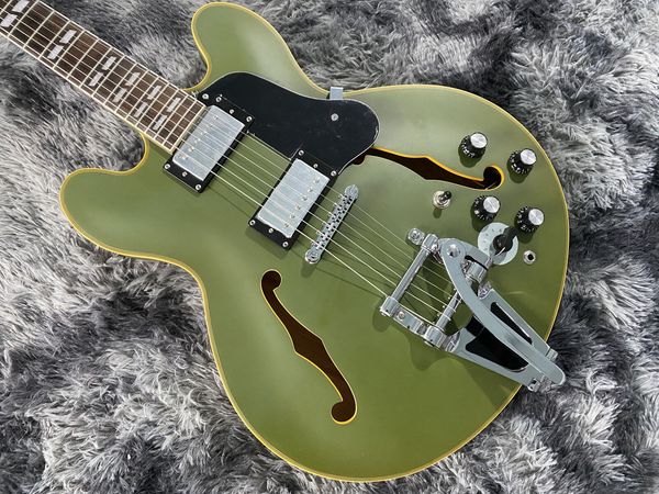 factory electric guitar maple body and neck matte green color
factory electric guitar maple body and neck matte green color