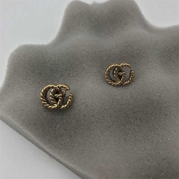 family classic snake pattern double letter women's net red silver needle versatile earrings, Golden
family classic snake pattern double letter women's net red silver needle versatile earrings, Golden