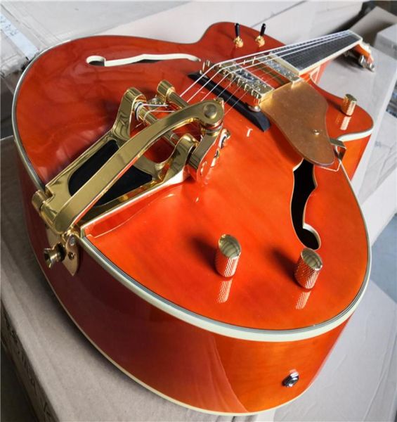 6120 6139 electric guitar orange flamed maple bigs tremolo bridge hollow body rosewood fretboard 22 frets2191783
6120 6139 electric guitar orange flamed maple bigs tremolo bridge hollow body rosewood fretboard 22 frets2191783