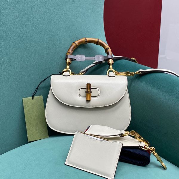 675797 classic women's tote high-end quality shoulder bag vintage bamboo bag saddle style crossbody bag with 2 straps and a makeup mirr
675797 classic women's tote high-end quality shoulder bag vintage bamboo bag saddle style crossbody bag with 2 straps and a makeup mirr
