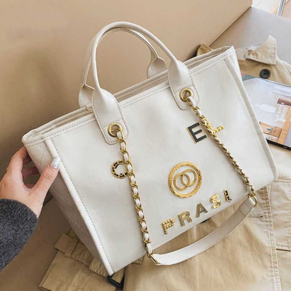 fashion women's luxury hand bags beach bag brand metal badge classic totes handbags small mini pearl handbag female capacity large leat
fashion women's luxury hand bags beach bag brand metal badge classic totes handbags small mini pearl handbag female capacity large leat