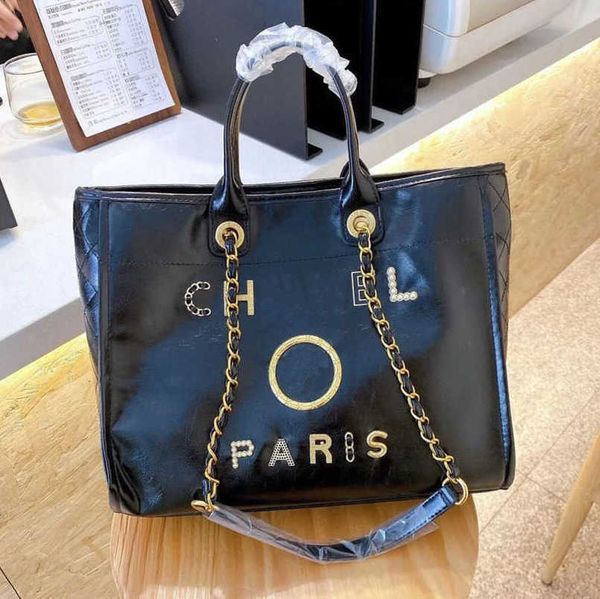 fashion luxury women's hand bags beach bag brand ch metal badge classic totes handbags small mini pearl handbag female capacity large l
fashion luxury women's hand bags beach bag brand ch metal badge classic totes handbags small mini pearl handbag female capacity large l