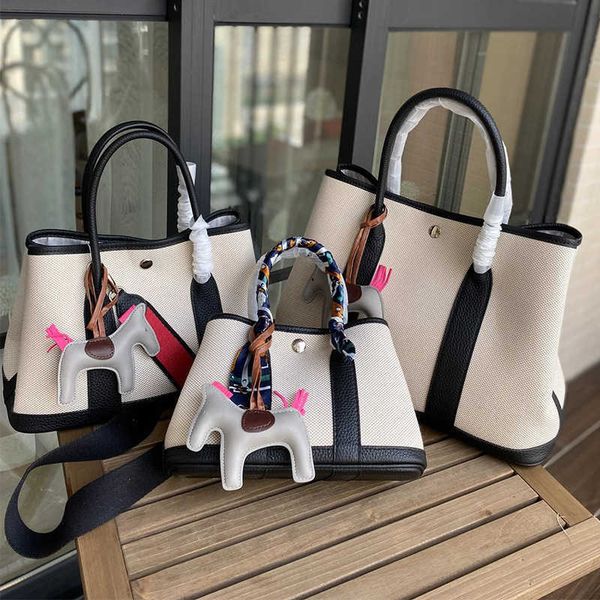 original designer bags h home canvas 2023 new garden bag contrast tote shopping fashion one shoulder portable high capacity 9tph
original designer bags h home canvas 2023 new garden bag contrast tote shopping fashion one shoulder portable high capacity 9tph