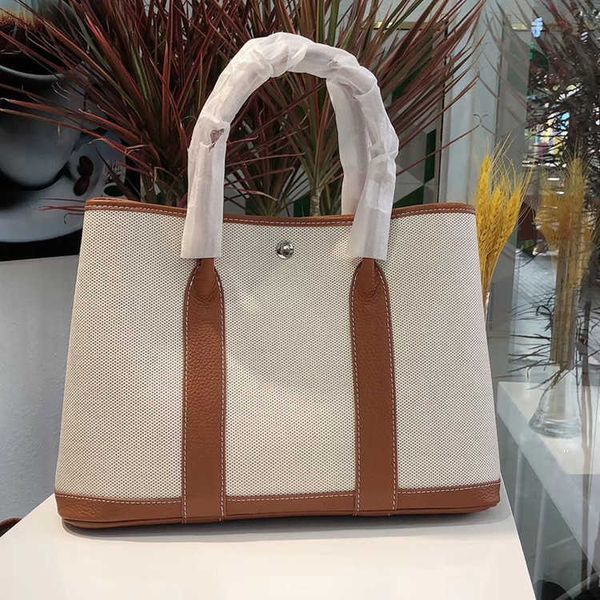 original designer bags h home canvas garden cowhide bag one shoulder crossbody portable business commuter leisure versatile large capacity t
original designer bags h home canvas garden cowhide bag one shoulder crossbody portable business commuter leisure versatile large capacity t