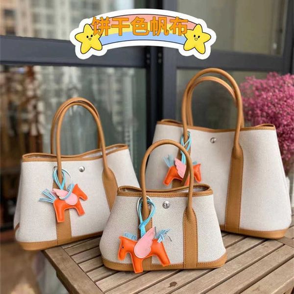 original designer bags h home autumn and winter fashion cowhide women's bag garden canvas with leather portable one shoulder oblique sp
original designer bags h home autumn and winter fashion cowhide women's bag garden canvas with leather portable one shoulder oblique sp