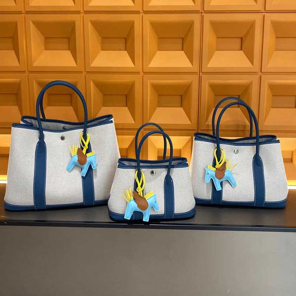 original designer bags h home genuine leather premium canvas garden bag 2023 new contrast color women's commuter casual one shoulder ha
original designer bags h home genuine leather premium canvas garden bag 2023 new contrast color women's commuter casual one shoulder ha