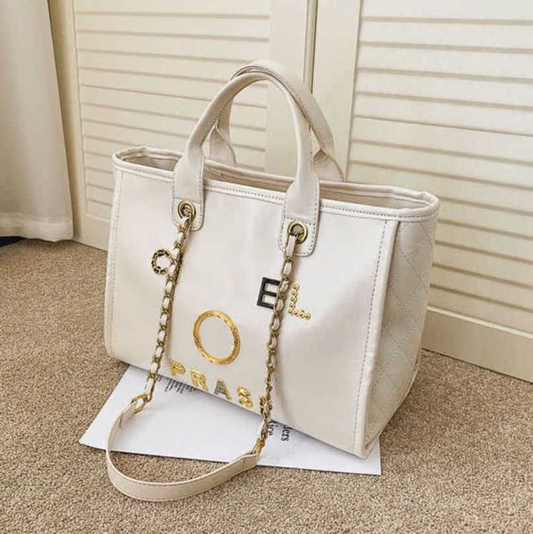 fashion women's luxury hand bags beach bag brand metal badge classic totes handbags small mini pearl handbag female capacity large leat
fashion women's luxury hand bags beach bag brand metal badge classic totes handbags small mini pearl handbag female capacity large leat