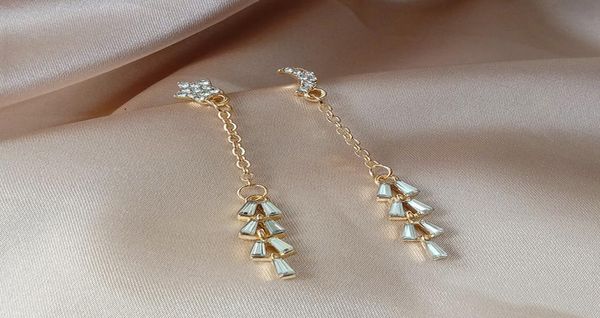 new star moon asymmetric tassel earrings korean temperament network red long crystal earrings for women whole2046948, Golden
new star moon asymmetric tassel earrings korean temperament network red long crystal earrings for women whole2046948, Golden