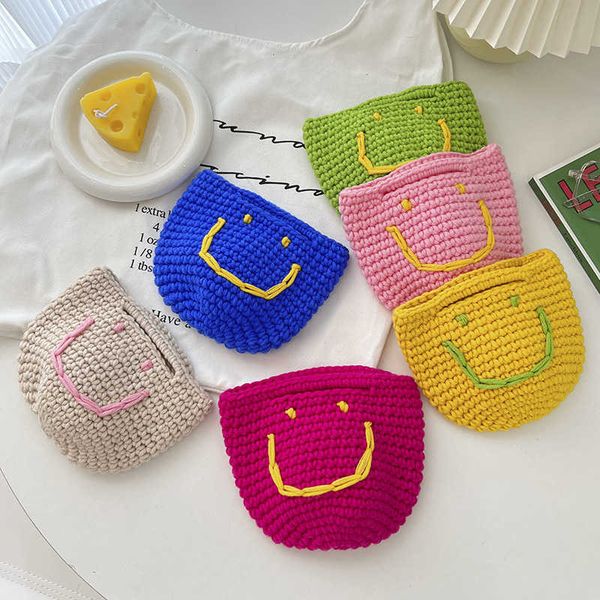 new and south korea sweet and cute knitted smiling face handheld mini bag foreign girls' handwoven handbag
new and south korea sweet and cute knitted smiling face handheld mini bag foreign girls' handwoven handbag