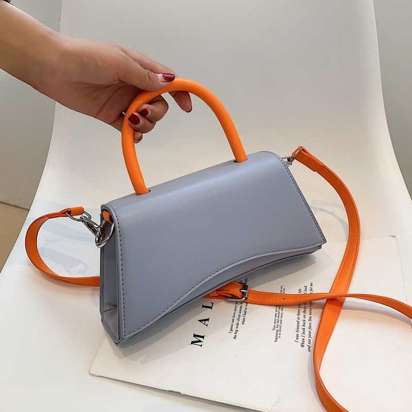 small fresh literary and artistic personality design sense contrast color women's bag fashion single shoulder portable messenger bag
small fresh literary and artistic personality design sense contrast color women's bag fashion single shoulder portable messenger bag