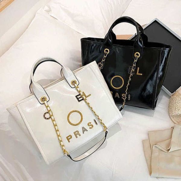 fashion luxury women's hand bags beach bag brand ch metal badge classic totes handbags small mini pearl handbag female capacity large l
fashion luxury women's hand bags beach bag brand ch metal badge classic totes handbags small mini pearl handbag female capacity large l