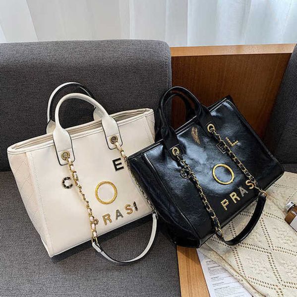 fashion luxury women's hand bags beach bag brand metal badge classic totes handbags small mini pearl handbag female capacity large leat
fashion luxury women's hand bags beach bag brand metal badge classic totes handbags small mini pearl handbag female capacity large leat