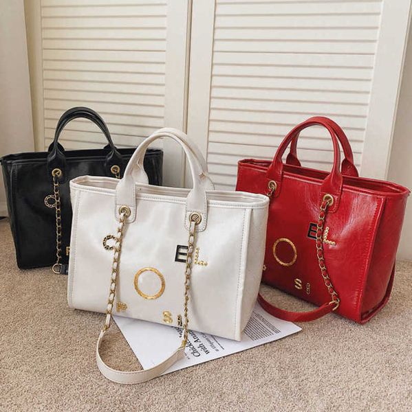 fashion women's luxury hand bags beach bag brand metal badge classic totes handbags small mini pearl handbag female capacity large leat
fashion women's luxury hand bags beach bag brand metal badge classic totes handbags small mini pearl handbag female capacity large leat