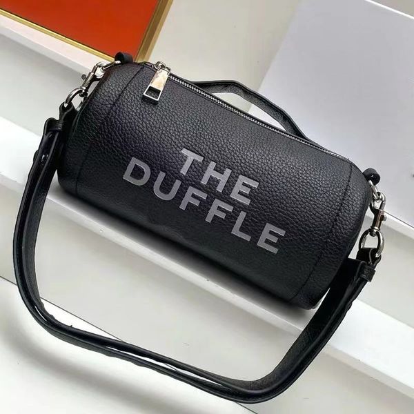 the duffle tote bag barrel shaped shoulder bags women handbags purse grain genuine leather fashion letter zipper closure crossbody bags adju
the duffle tote bag barrel shaped shoulder bags women handbags purse grain genuine leather fashion letter zipper closure crossbody bags adju