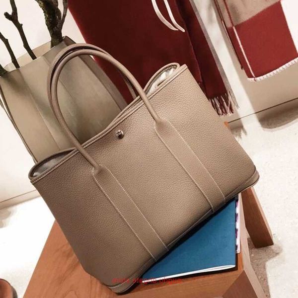 original h home tote bags wholesale new minimalist garden bag genuine leather womens one shoulder diagonal cross portable large mother sh ha
original h home tote bags wholesale new minimalist garden bag genuine leather womens one shoulder diagonal cross portable large mother sh ha