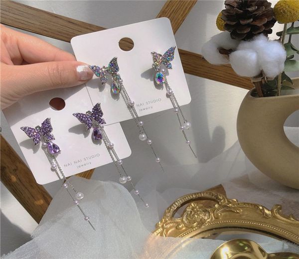 new two wear exquisite butterfly pearl earrings tassel super immortal temperament net red earrings fashion jewelry whole1381561, Golden
new two wear exquisite butterfly pearl earrings tassel super immortal temperament net red earrings fashion jewelry whole1381561, Golden