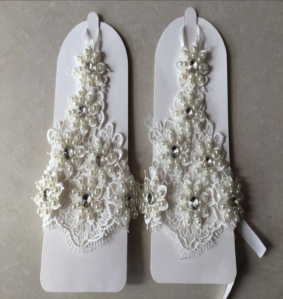 2017 new luxury full lace pearls bridal gloves wedding gloves wedding accessories gloves for brides fingerless wrist length one si2615307, White
2017 new luxury full lace pearls bridal gloves wedding gloves wedding accessories gloves for brides fingerless wrist length one si2615307, White