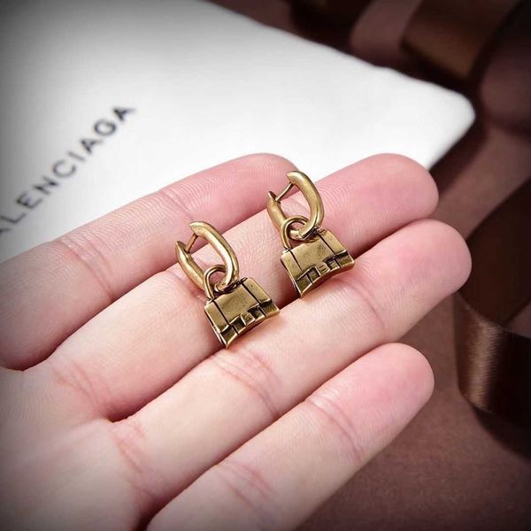 earrings designer high edition family antique copper fashionable and personalized earrings punk bag earrings, Golden
earrings designer high edition family antique copper fashionable and personalized earrings punk bag earrings, Golden