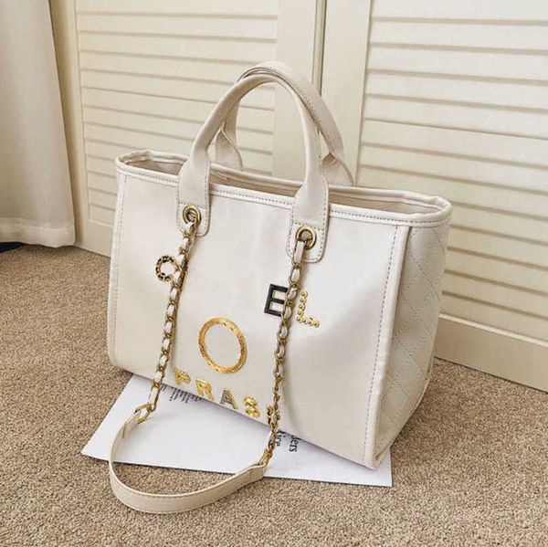 fashion women's luxury hand bags beach bag brand ch metal badge classic totes handbags small mini pearl handbag female capacity large l
fashion women's luxury hand bags beach bag brand ch metal badge classic totes handbags small mini pearl handbag female capacity large l