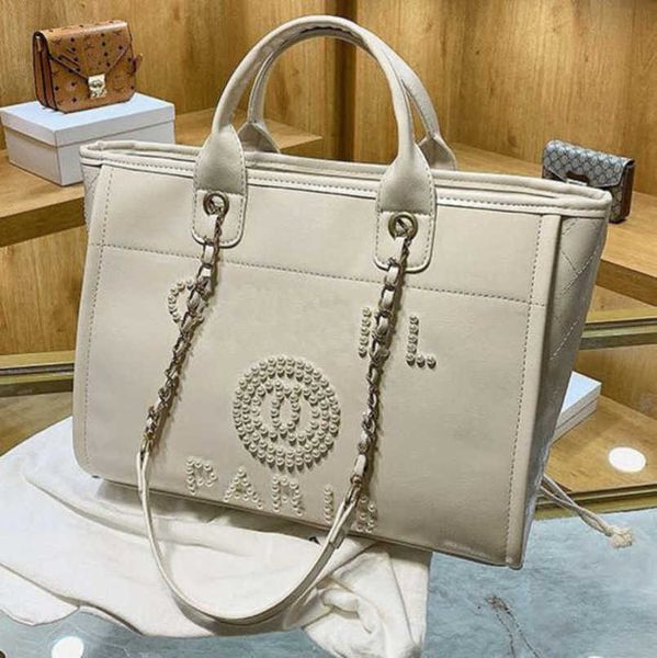 luxury fashion women's hand bags beach bag brand metal badge classic totes handbags small mini pearl handbag female capacity large leat, Black;red
luxury fashion women's hand bags beach bag brand metal badge classic totes handbags small mini pearl handbag female capacity large leat, Black;red