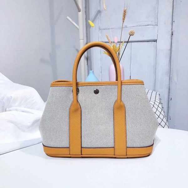 original designer bags h home spring and 2023 summer new canvas garden bag women's one shoulder oblique straddle portable fashion shopp
original designer bags h home spring and 2023 summer new canvas garden bag women's one shoulder oblique straddle portable fashion shopp