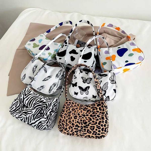 new contrast color women's mini handbag edition cute print pattern underarm one shoulder handheld stick bag
new contrast color women's mini handbag edition cute print pattern underarm one shoulder handheld stick bag