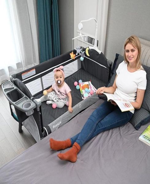 multifunctional foldable crib splicing large bed removable baby bedside cradle with diaper table and toy stand cribs3815419
multifunctional foldable crib splicing large bed removable baby bedside cradle with diaper table and toy stand cribs3815419