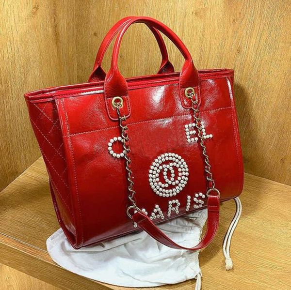 fashion women's luxury hand bags beach bag brand ch metal badge classic totes handbags small mini pearl handbag female capacity large l
fashion women's luxury hand bags beach bag brand ch metal badge classic totes handbags small mini pearl handbag female capacity large l
