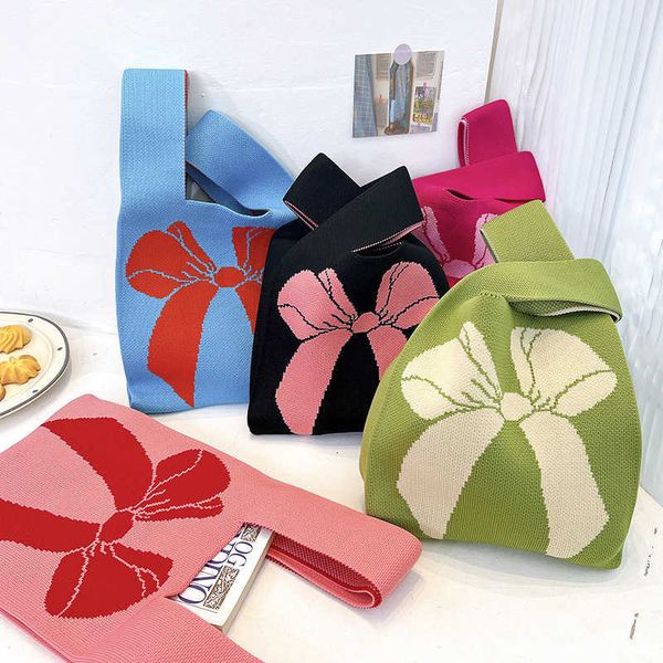 bow knot handheld bag for women and south korea simple handheld gift bag design contrast color knitted tote rice box
bow knot handheld bag for women and south korea simple handheld gift bag design contrast color knitted tote rice box