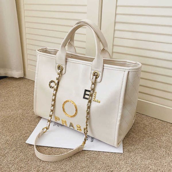 luxury fashion women's hand bags beach bag brand metal badge classic totes handbags small mini pearl handbag female capacity large leat
luxury fashion women's hand bags beach bag brand metal badge classic totes handbags small mini pearl handbag female capacity large leat