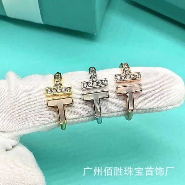 famous brand tiffay s925 sterling silver double t ring fashion versatile personality white fritillaria full diamond handset couples
famous brand tiffay s925 sterling silver double t ring fashion versatile personality white fritillaria full diamond handset couples