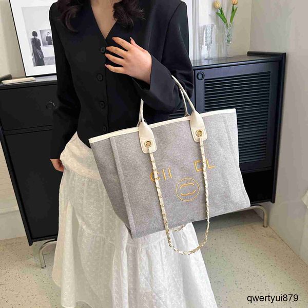 designer bag women's summer fashion beach bag channel tote shopping tote bag letter embossing luxury handbag lady canvas cross body clu
designer bag women's summer fashion beach bag channel tote shopping tote bag letter embossing luxury handbag lady canvas cross body clu