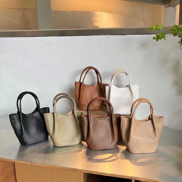 production of women's portable mini vegetable basket with leather layer and fashionable small bag
production of women's portable mini vegetable basket with leather layer and fashionable small bag