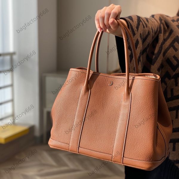 10A designer bag High quality hand-held calfskin Women Purse Commuter Bag Plain Genuine Leather Brand Shoulder Crossbody Bag Hanging Garden Party Bag Fashion Totes, Beige
10A designer bag High quality hand-held calfskin Women Purse Commuter Bag Plain Genuine Leather Brand Shoulder Crossbody Bag Hanging Garden Party Bag Fashion Totes, Beige