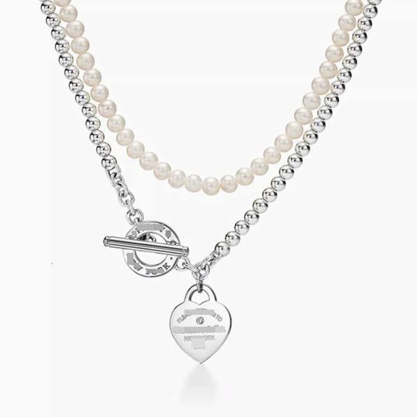 Tiff Necklace Designer luxury fashion jewelry high version 925 Silver Pearl necklace OT Buckle CNC Double Layer Fashion accessory
Tiff Necklace Designer luxury fashion jewelry high version 925 Silver Pearl necklace OT Buckle CNC Double Layer Fashion accessory