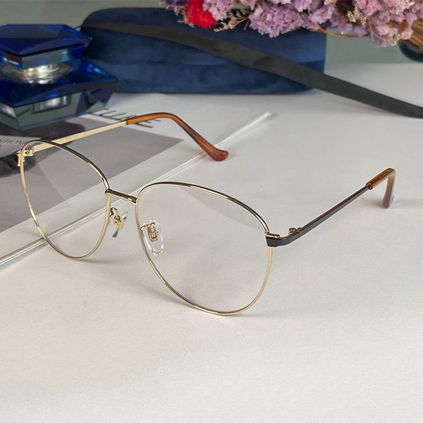 High quality designer optical eyewear fashion classic mens and womens metal frame oval frame transparent glasses driving work conference with box 0577OA
High quality designer optical eyewear fashion classic mens and womens metal frame oval frame transparent glasses driving work conference with box 0577OA