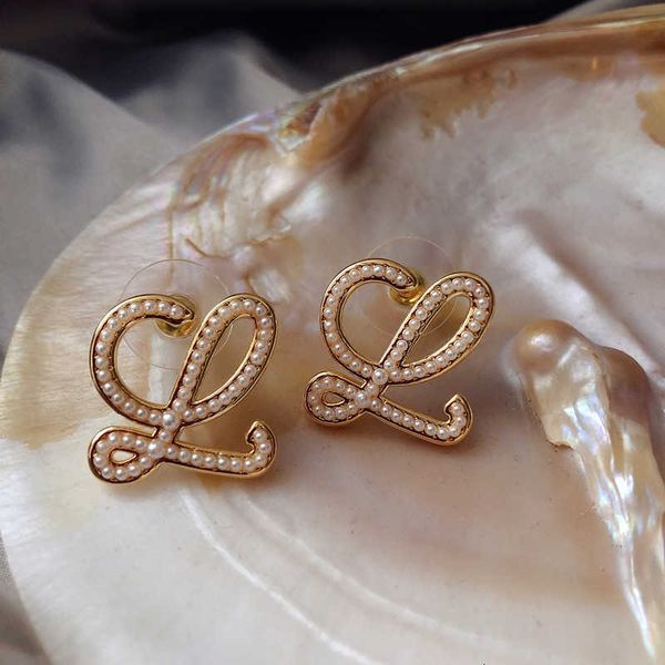 Designer Earrings loews Luxury jewelry top accessories new classic pearl curve earrings popular geometric abstract style earrings jewelry Christmas gift
Designer Earrings loews Luxury jewelry top accessories new classic pearl curve earrings popular geometric abstract style earrings jewelry Christmas gift