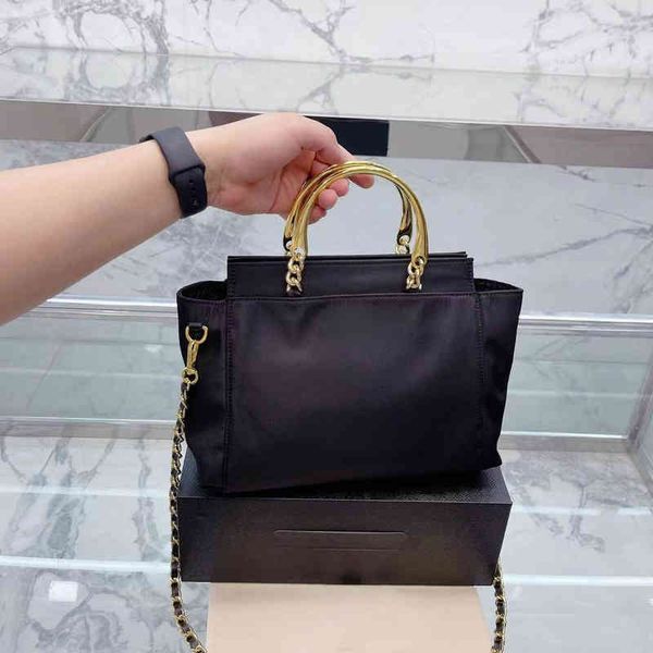 cross body bag 2022 brand p new medieval parachute oxford canvas triangle tag handbag metal handle wing bat shopping bag
cross body bag 2022 brand p new medieval parachute oxford canvas triangle tag handbag metal handle wing bat shopping bag