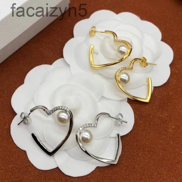 charm designer celi saijia love pearl earrings female brass 925 silver needle heart-shaped with diamond twist pattern 3p8m, Golden
charm designer celi saijia love pearl earrings female brass 925 silver needle heart-shaped with diamond twist pattern 3p8m, Golden
