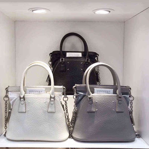 new bag mm6 portable messenger women's versatile chain niche leather 5ac shell purses ladies luxury handbags designers hand bags design
new bag mm6 portable messenger women's versatile chain niche leather 5ac shell purses ladies luxury handbags designers hand bags design