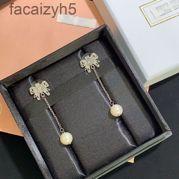 charm designer miao family diamond bowknot pearl long tassel earrings celebrity temperament fashionable versatile light and luxurious earrin, Golden
charm designer miao family diamond bowknot pearl long tassel earrings celebrity temperament fashionable versatile light and luxurious earrin, Golden