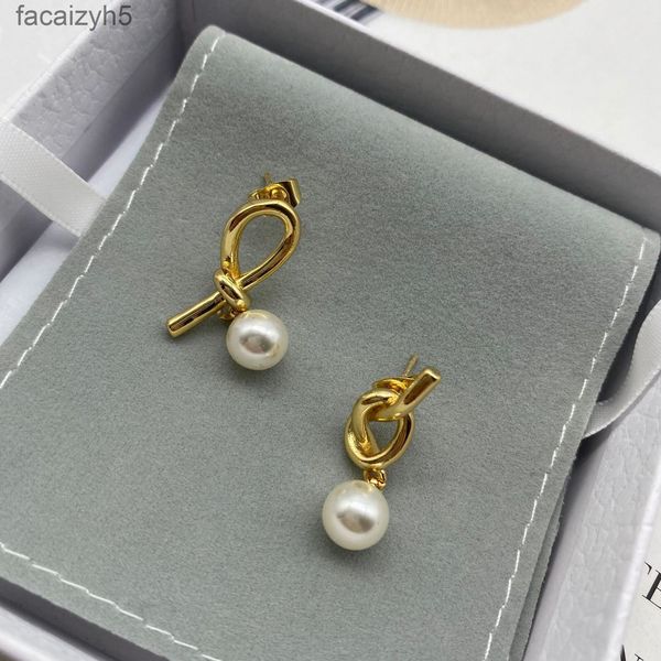 charm designer saijia bow asymmetric pearl temperament earrings female french cold wind ceri knot personalized earringsshxt, Golden
charm designer saijia bow asymmetric pearl temperament earrings female french cold wind ceri knot personalized earringsshxt, Golden