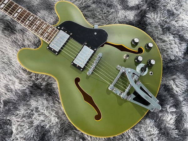 chinese electric guitar matte green color jazz hollow body 335 maple mahogany neck 6 strings
chinese electric guitar matte green color jazz hollow body 335 maple mahogany neck 6 strings