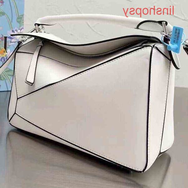 handbags loews crossbody designer bags contrast puzzle color cow leather geome