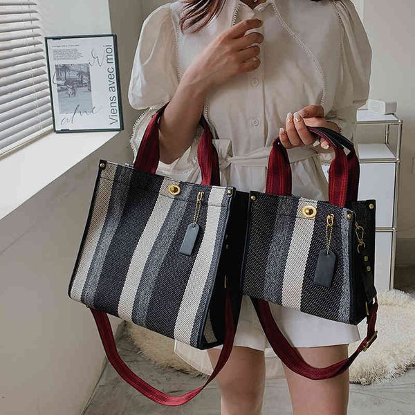 messenger bags canvas bag portable tote women's 2022 new striped wide shoulder strap sling shoulder bag handbags
messenger bags canvas bag portable tote women's 2022 new striped wide shoulder strap sling shoulder bag handbags