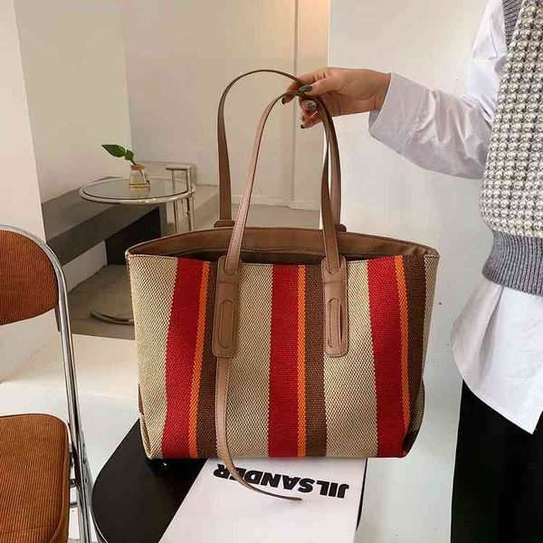 messenger bags women's bag 2022 new canvas portable one shoulder casual stripe tote bag handbags
messenger bags women's bag 2022 new canvas portable one shoulder casual stripe tote bag handbags