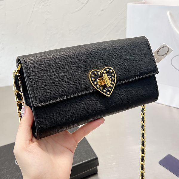 designer women saffiano love heart envelope bag italy brand cowhide leather crossbody handbags mini chain strap shoulder handbag luxurys des
designer women saffiano love heart envelope bag italy brand cowhide leather crossbody handbags mini chain strap shoulder handbag luxurys des