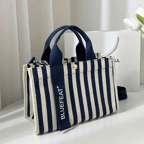 bags canvas single shoulder messenger bag women's 2022 new striped portable mommy bag multi-layer texture tote purses
bags canvas single shoulder messenger bag women's 2022 new striped portable mommy bag multi-layer texture tote purses