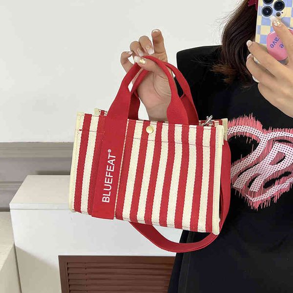 messenger bags canvas sling shoulder bag women's 2022 new striped portable mommy bag multi-layer texture tote handbags
messenger bags canvas sling shoulder bag women's 2022 new striped portable mommy bag multi-layer texture tote handbags